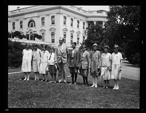 Calvin Coolidge and group of children outside White House, Washington, D.C.