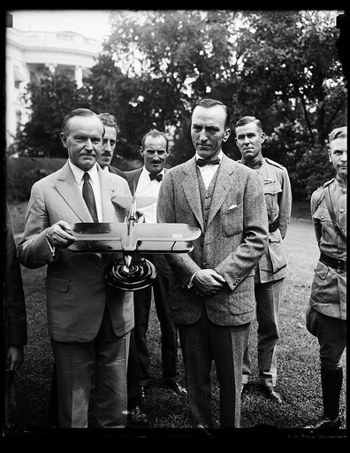 Calvin Coolidge with model airplane. White House, Washington, D.C.