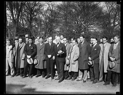 The Centre College football team, of Kentucky, in Washington to play Georgetown University, called on President Coolidge, today, Nov. 14th. In the center of the group can be seen the President and Senator Ernst, of Kentucky