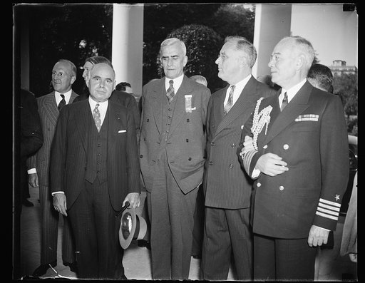 Group, left to right: Herbert H. Lehman, Gov. of New York, George Peery, Gov. of Virginia, President Franklin D. Roosevelt, and Captain Paul Bastedo, Naval Aide to the White House; all attended a luncheon at  White House, Washington, D.C.