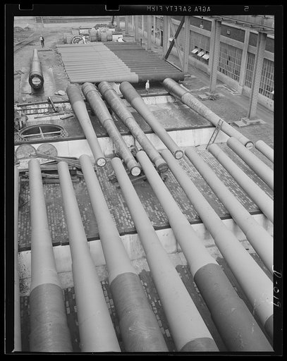 Ready for battle. Finished guns of large caliber awaiting shipment in an eastern Navy yard. This is just one of the eleven Navy arsenals which are producing guns for the two-ocean fleet