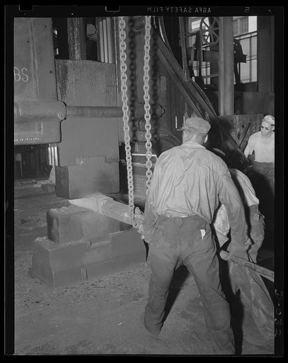 Small part for a big gun. Forging part of a large gun in an eastern Navy yard. This is one of eleven arsenals which have stepped up production to top speed for the war program