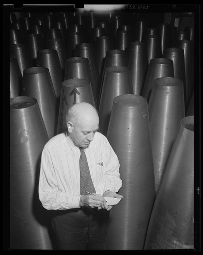 Torpedo inspection. Assistant shop superintendant at an eastern Navy arsenal, which is working on a twenty-four hour basis for the war program