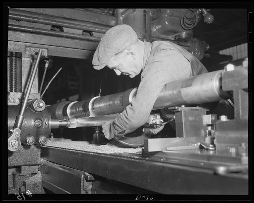 Heavy hardware. Building the slide seats for medium-caliber guns being produced for national defense in an eastern arsenal