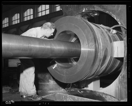 Big throat, big voice. Boring operations are finished on a major-caliber gun at an eastern arsenal. This big boy will soon be ready to speak with authority for total warfare
