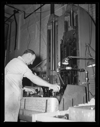 New machines for war program. This is a broaching machine. Broaching is an efficient manufacturing method now being successfully adapted to gun making