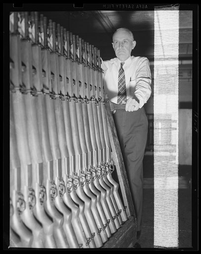A rack of Garand rifles on their way to the shipping room. Soon they will be playing an active part in our work