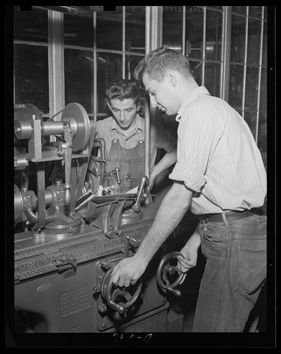 Training for war. This apprentice school lad will become a soldier of industry in our war preparation. Right now he's learning how to grind tools at an eastern armory