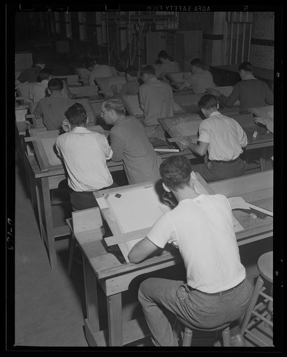 Brushing up. Apprentices study drafting-room technique in classes at an eastern arsenal. Every kind of skill is going into preparation for war work