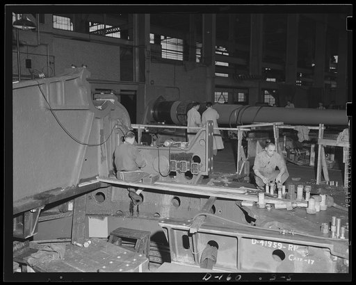Cradle for a big gun. The floor beam assembly on a 16-inch gun barbette carriage moves forward in an eastern arsenal