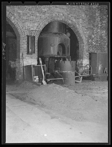 Shenandoah Valley. Penn Foundry Manufacturing Company at Waynesboro, Virginia. Three cavernous buildings filled with moldering machinery. Inhabited only by flocks of pigeons who nest among the unused pulley belts