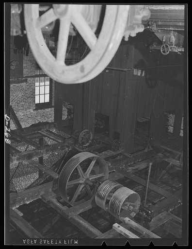Shenandoah Valley. Penn Foundary Manufacturing Company at Waynesboro, Virginia. Three cavernous buildings filled with moldering machinery. Inhabited only by flocks of pigeons who nest among the pulley belts