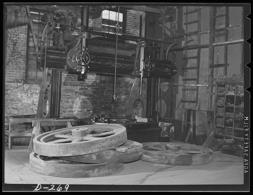 Shenandoah Valley. Penn Foundary Manufacturing Company at Waynesboro, Virginia. Three cavernous buildings filled with moldering machinery. Inhabited only by flocks of pigeons who nest among the pulley belts