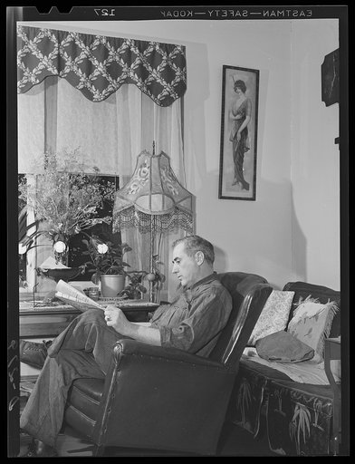Shenandoah Valley. Jack Lilly, veteran Wilbarger mechanic, relaxes in the front parlor of his modest home after work. He has worked for the same people for twenty-one years