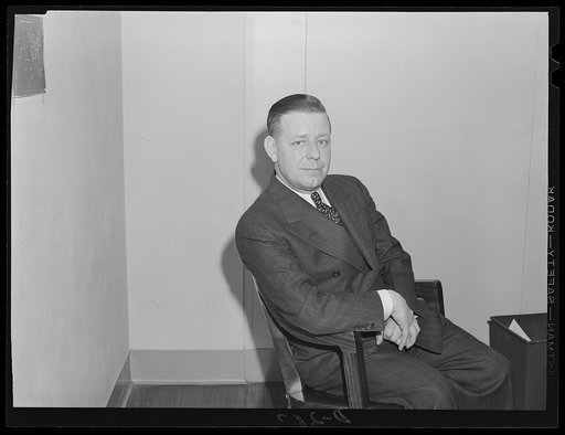Howard B. Cunningham, assistant director, division of purchases, Office of Production Management (OPM), still director of National Biscuit Company, New York City