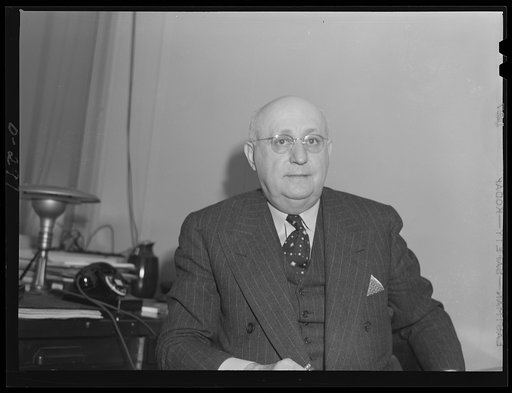 Jesse C. Nichols, chief of Supplies Section, Production Division. Formerly president of Nichols Company