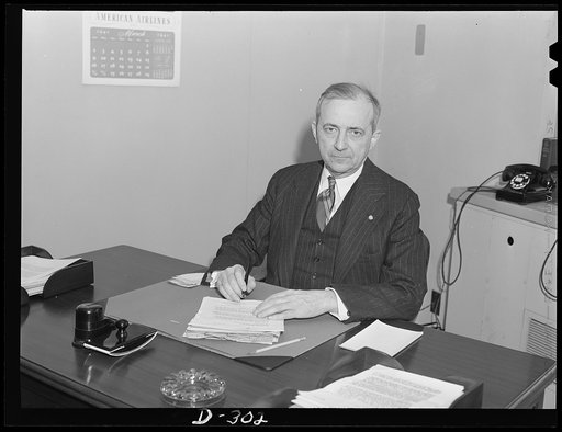 Channing R. Dooley, director of Training within Industry, Works Project Board. Manager of Industrial Relations, Socony Vacumn Oil Company., New York City