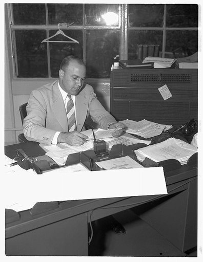 H.K. Masters, consultant of miscellaneous minerals, Materials Branch, Production Management