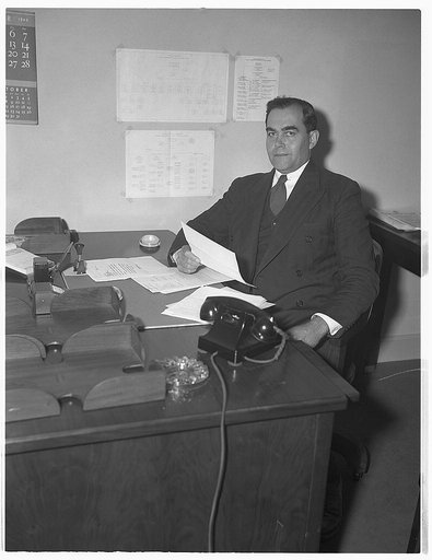 Dr. William Y. Elliott, consultant, Industrial Division of Office of Production Management (OPM)