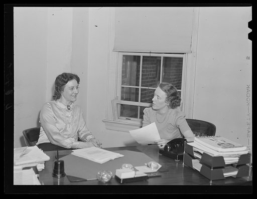 Left: Loda Mae Davis, assistant to the chief, Consumer Contacts Section, Consumer Division, Office for Price Administration (OPA). Former association: instructor in Consumer Problems, San Mateo Junior College; author, lecturer. Right: Jean Holmes, clerical assistant, Consumer Division, OPA. Former a