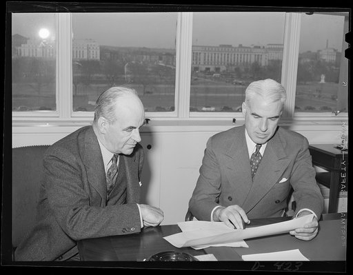 Edward R Stettinius, Jr., former director, Priorities Division, Office of Production Management (OPM), and currently (September 2, 1941) lend-lease Administrator. Dr. Ernest M. Hopkins, Minerals and Metals Executive of the Priorities Division. President of Dartmouth College