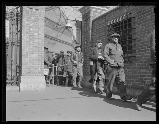Another "Line of Defense." The lunch-time whistle blows and workers file from an eastern Navy yard for re-fuelling during the dailey break in building ships and supplies for the two-ocean Navy