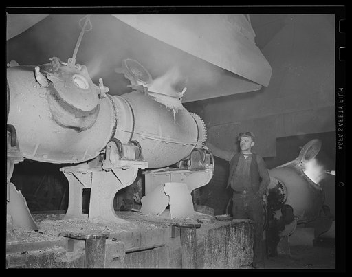 Putting on the heat. Brass ingots are brought to the "boiling" point in fiery furnances at an eastern Navy yard, where production for defense is stepped up to new highs