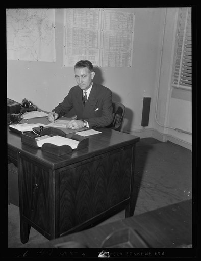 Dr. Ernest W. Reid, Assistant Chief, Chemical and Allied Production. Formerly Senior Industrial Fellow, Mellon Institute