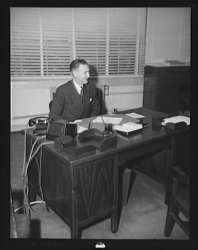 Dr. Ernest W. Reid, Assistant Chief, Chemical and Allied Production. Formerly Senior Industrial Fellow, Mellon Institute
