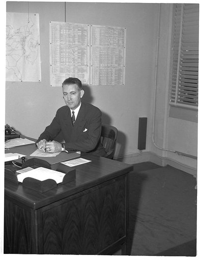 Dr. Ernest W. Reid, Assistant Chief, Chemical and Allied Products. Formerly Senior Industrial Fellow, Mellon Institute