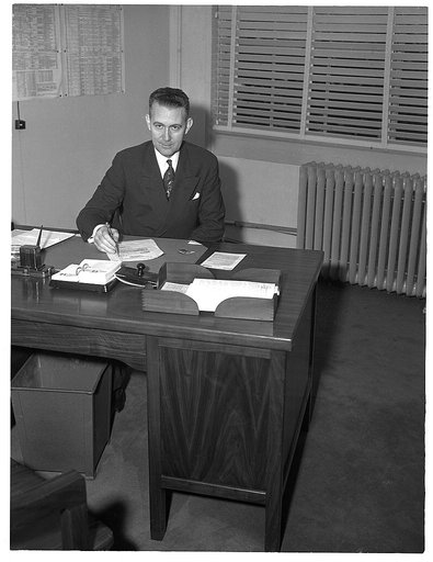 Dr. Ernest W. Reid, Assistant Chief, Chemical and Allied Products. Formerly Senior Industrial Fellow, Mellon Institute