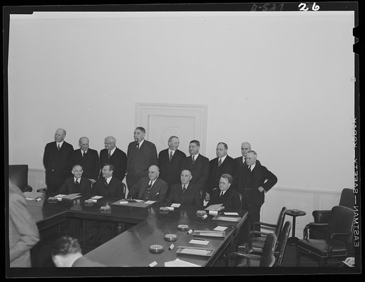 Standing, left to right: Undersecretary of Labor; Eugene Meyer, publisher of the Washington Post; Roger D. Lapham, president of the American Hawaiian Steamship Company; Cyrus Ching, Vice President, U.S. Rubber Corporation; Walter C. Teagle, former President, Standard Oil Company of New Jersey; Georg