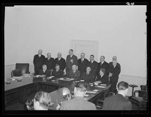 Standing, left to right: Charles v. McLaughlin, Undersecretary of Labor; Eugene Meyer, publisher of the Washington Post; Roger D. Lapham, president of the American Hawaiian Steamship Company; Cyrus Ching, Vice President, U.S. Rubber Corporation; Walter C. Teagle, former President, Standard Oil Compa