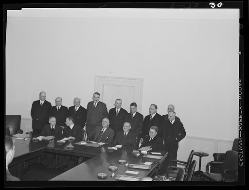 Standing, left to right: Charles v. McLaughlin, Undersecretary of Labor; Eugene Meyer, publisher of the Washington Post; Roger D. Lapham, president of the American Hawaiian Steamship Company; Cyrus Ching, Vice President, U.S. Rubber Corporation; Walter C. Teagle, former President, Standard Oil Compa
