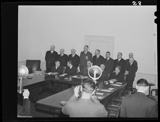 Standing, left to right: Charles v. McLaughlin, Undersecretary of Labor; Eugene Meyer, publisher of the Washington Post; Roger D. Lapham, president of the American Hawaiian Steamship Company; Cyrus Ching, Vice President, U.S. Rubber Corporation; Walter C. Teagle, former President, Standard Oil Compa