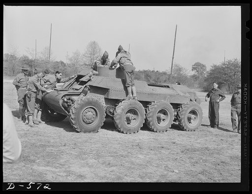 Soldiers inspecting new trackless tank during demonstration at Fort Myer, Virginia. (For further data see caption for pix D-570