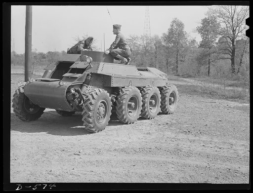Soldier inspecting new trackless tank during demonstration at Fort Myer, Virginia. For further data see caption for pix D-570