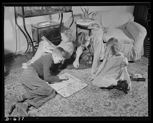 The Herbster youngsters are hard on shoes, clothes and the larder. Left to right they are: Robert, 12; Irene, 11; Joseph, 14; and Ruth, 9. The boys belong to the Service League of Mravlag Manor. They act as junior police, taking care of the young children and seeing there is peace and order in the n