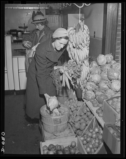 Mrs. Catherine Herbster budgets herself carefully. She buys those vegetables and food which are plentiful and cheap. She must see that her family of growing children get the right foods to make them strong and healthy