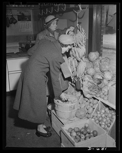 Mrs. Catherine Herbster budgets herself carefully. She buys those vegetables and food which are plentiful and cheap. She must see that her family of growing children get the right foods to make them strong and healthy