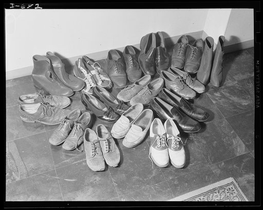 This is the Herbster shoe supply. A new pair of shoes a month is needed by the family. Mrs. Herbster finds that shoe prices have not increased