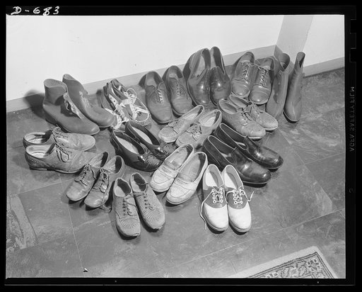 This is the Herbster shoe supply. A new pair of shoes a month is needed by the family. Mrs. Herbster finds that shoe prices have not increased