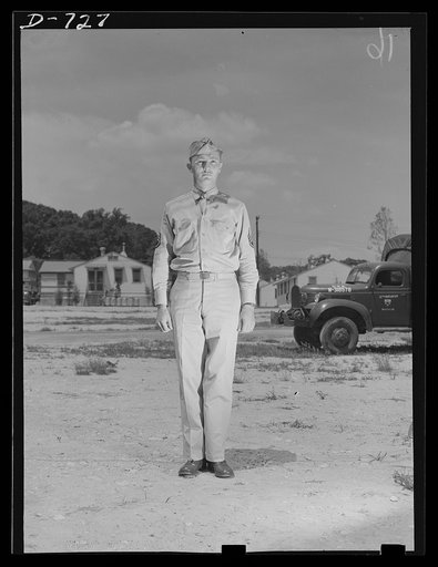 Staff Sergeant William Light, Service Company, 12th Infantry (motor maintenance sergeant). Standing at attention weraing overseas cap and service uniform (a uniforn usually worn in garrisons in the summer). Arlington Cantonment, Arlington, Virginia