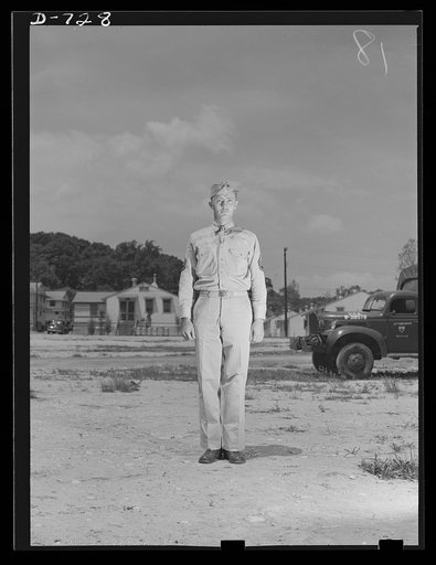 Staff Sergeant William Light, Service Company, 12th Infantry (motor maintenance sergeant). Standing at attention weraing overseas cap and service uniform (a uniforn usually worn in garrisons in the summer). Arlington Cantonment, Arlington, Virginia