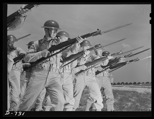 Members of Infantry Squad Company M, 12th Infantry, executing bayonet lunge or parry manuever. Arlington Cantonment, Arlington, Virginia