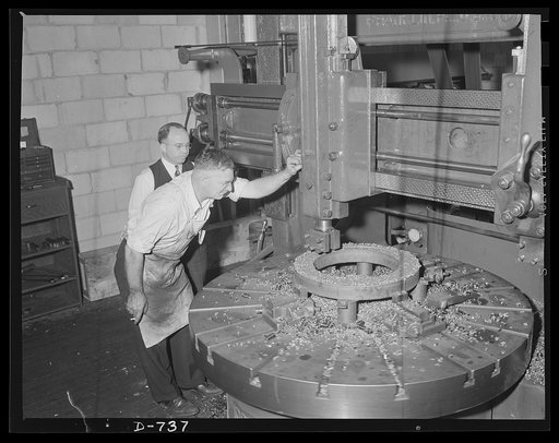 This turning mill is machining a steel index fixture for another machine. Plant of Frederick Colman and Sons, Inc., Detroit, Michigan