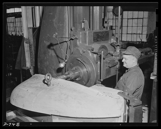 A boring mill machining a cast-iron die which, when finished, will be used to stamp out automobile fenders. Plant of Frederick Colman & Sons, Inc., Detroit, Michigan