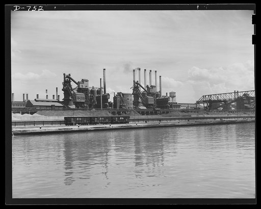 This is the home port for twenty-nine ships in the Ford fleet. Coal, limestone and iron ore are basic products in the automotive industry. Storage bins at the plant here have a capacity of two million tons. Ford River Rouge plant, May 1941
