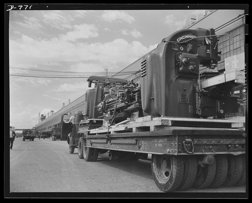 The Ford Motor Company has constructed and equipped, in eight months an airplane engine building. It covers 17.8 acres, will employ over 14,000 men, will turn out Pratt and Whitney engines at the rate of one an hour for sixteen hours a day. Building and machinery cost twenty-three million dollars. P