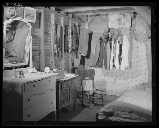 Defense housing, Erie, Pennsylvania. Living conditions were so crowded in Erie, Pennsylvania, that a defense worker and his family of three were found to be living in this attic room. One of the defense industries there, which holds large contracts for the Navy, expects an increase of 4,000 workers 
